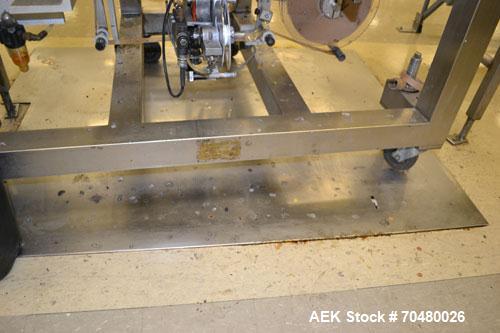 Used Accraply IM2000B bottom pressure sensitive spot labeler. Capable of speeds up to 150 containers per minute. Container size range: (Length) .5" to 12" (Width) .5" to 6" (Height) .5" to 4". Label ...