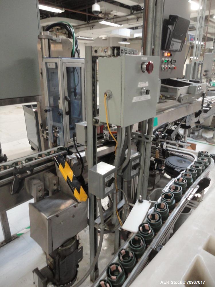 Used Accraply Bottom Pressure Sensitive Labeler, with side transfer belts and Allen hot stamp coder.