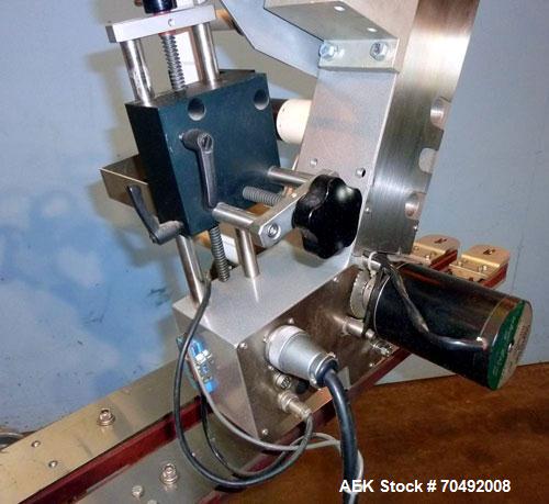 Used CVC Technologies Pressure Sensitive Wipe-On Label Applicator, Model Luca IP65. Up to 5" wide label, 14" label roll diameter with 1-1/2" core.  45"Long x 1" high rubber side carry belts.