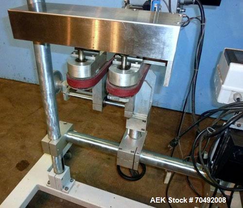 Used CVC Technologies Pressure Sensitive Wipe-On Label Applicator, Model Luca IP65. Up to 5" wide label, 14" label roll diameter with 1-1/2" core.  45"Long x 1" high rubber side carry belts.