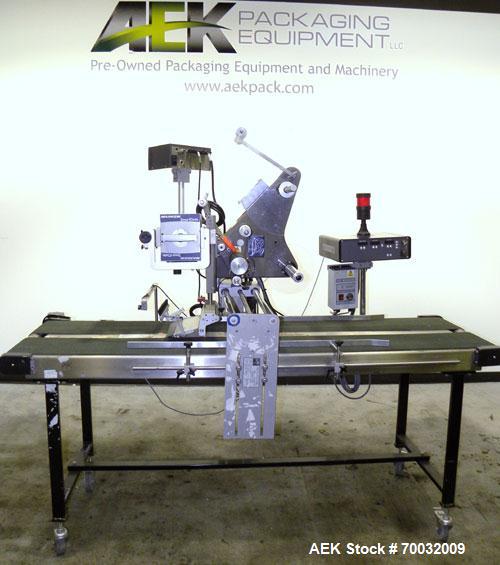 Used Harland Comet Pressure Sensitive Top Labeler, Head unit # 7809. Size range: width 10mm to 205mm, length 10mm to unlimited. Label core reel 76mm, diameter 400mm. Label web speed up to 42 meters/m...