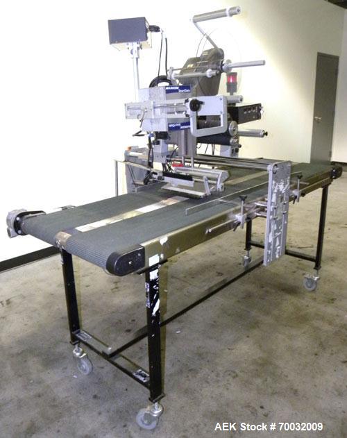 Used Harland Comet Pressure Sensitive Top Labeler, Head unit # 7809. Size range: width 10mm to 205mm, length 10mm to unlimited. Label core reel 76mm, diameter 400mm. Label web speed up to 42 meters/m...