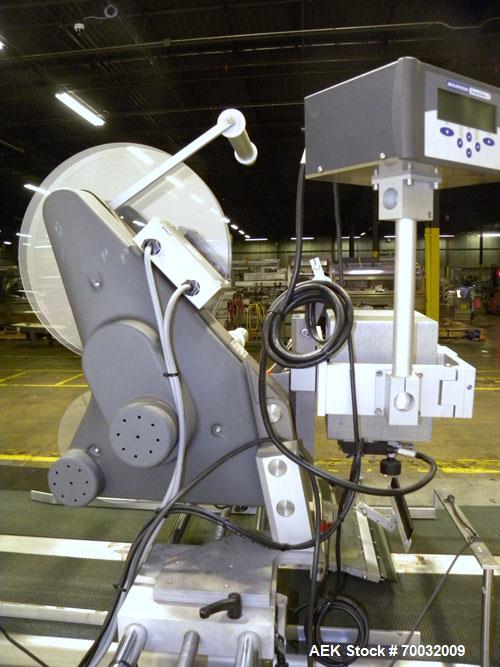 Used Harland Comet Pressure Sensitive Top Labeler, Head unit # 7809. Size range: width 10mm to 205mm, length 10mm to unlimited. Label core reel 76mm, diameter 400mm. Label web speed up to 42 meters/m...