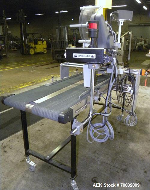 Used Harland Comet Pressure Sensitive Top Labeler, Head unit # 7809. Size range: width 10mm to 205mm, length 10mm to unlimited. Label core reel 76mm, diameter 400mm. Label web speed up to 42 meters/m...