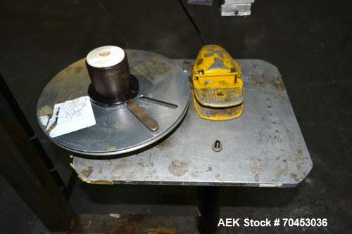Used LSI Loose Loop Print & Apply Labeler, Model 1360, capable of 120 products per minute. Can accommodate up to 4" x 4" labels. Foot pedal controls. Mounted on a stand with casters. Missing printer....