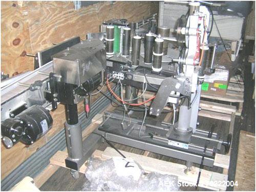 Used-LSI Spot Pressure Sensitive Labeler. Has conveyor and Norwood hot stamp coder.