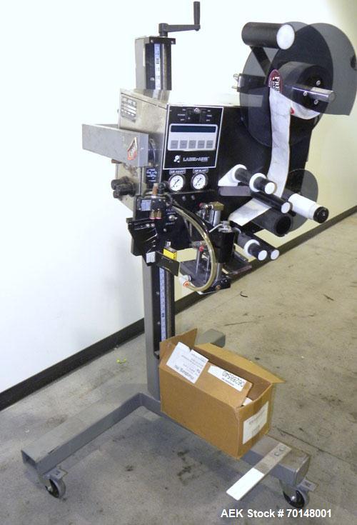 Used Label-Aire Model 2114 CDL High Speed Pressure Sensitive Spot Labeler. Machine is capable of speeds up to 1250 linear inches of web per minute. Has a label size range: length 3/4" to 5.5" or 19mm...