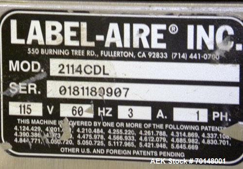 Used Label-Aire Model 2114 CDL High Speed Pressure Sensitive Spot Labeler. Machine is capable of speeds up to 1250 linear inches of web per minute. Has a label size range: length 3/4" to 5.5" or 19mm...