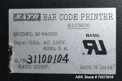 Used Lord Label Systems Print & Apply Portable Pressure Sensitive Labeler. Includes a Sato bar code printer, model M-8400S. Mounted on a stand with casters. Last placing labels on bundles of cartons.