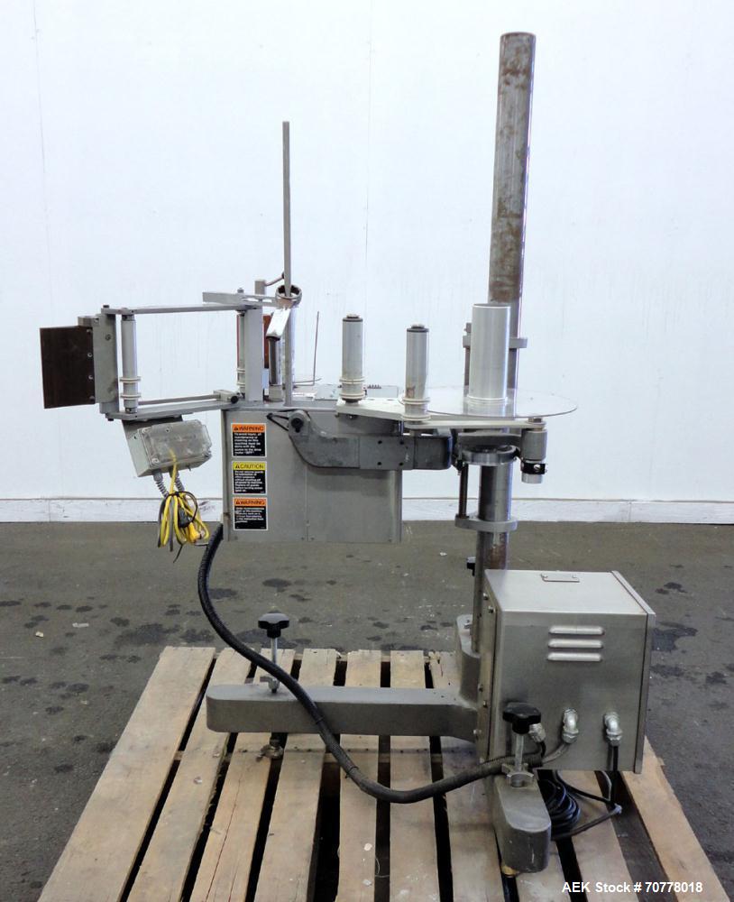Used New Jersey Machine 305SL Colt Pressure Sensitive Labeler. Machine is rated at speeds of up to 800" of label per minute. Label range minimum 5/8" high x 3/8" long, maximum 5" high x 5" long. Roll...