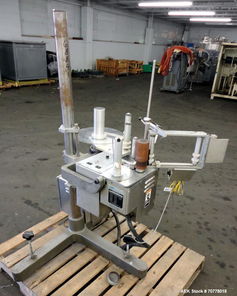 Used New Jersey Machine 305SL Colt Pressure Sensitive Labeler. Machine is rated at speeds of up to 800" of label per minute. Label range minimum 5/8" high x 3/8" long, maximum 5" high x 5" long. Roll...
