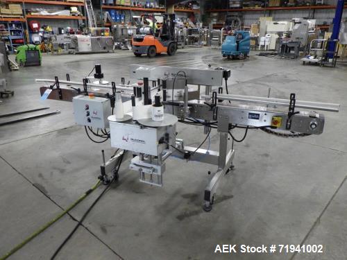 Used Quadrel Model Moduline 3-Panel, Quadrel Q55 L.H. Labeling Head. Adjustable height. 7.5 in. tall plate, currently set up to run 4 in. tall labels, pneumatic flaps for labels. Plastic table-top ch...