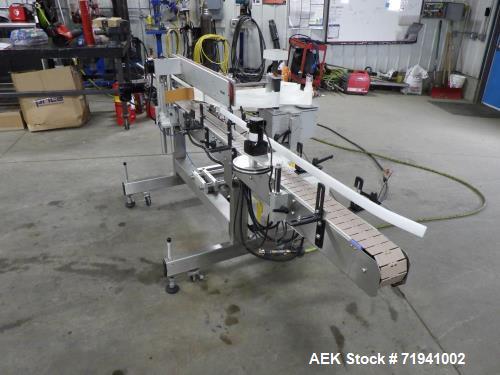 Used Quadrel Model Moduline 3-Panel, Quadrel Q55 L.H. Labeling Head. Adjustable height. 7.5 in. tall plate, currently set up to run 4 in. tall labels, pneumatic flaps for labels. Plastic table-top ch...