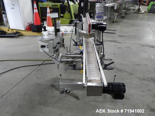 Used Quadrel Model Moduline 3-Panel, Quadrel Q55 L.H. Labeling Head. Adjustable height. 7.5 in. tall plate, currently set up to run 4 in. tall labels, pneumatic flaps for labels. Plastic table-top ch...