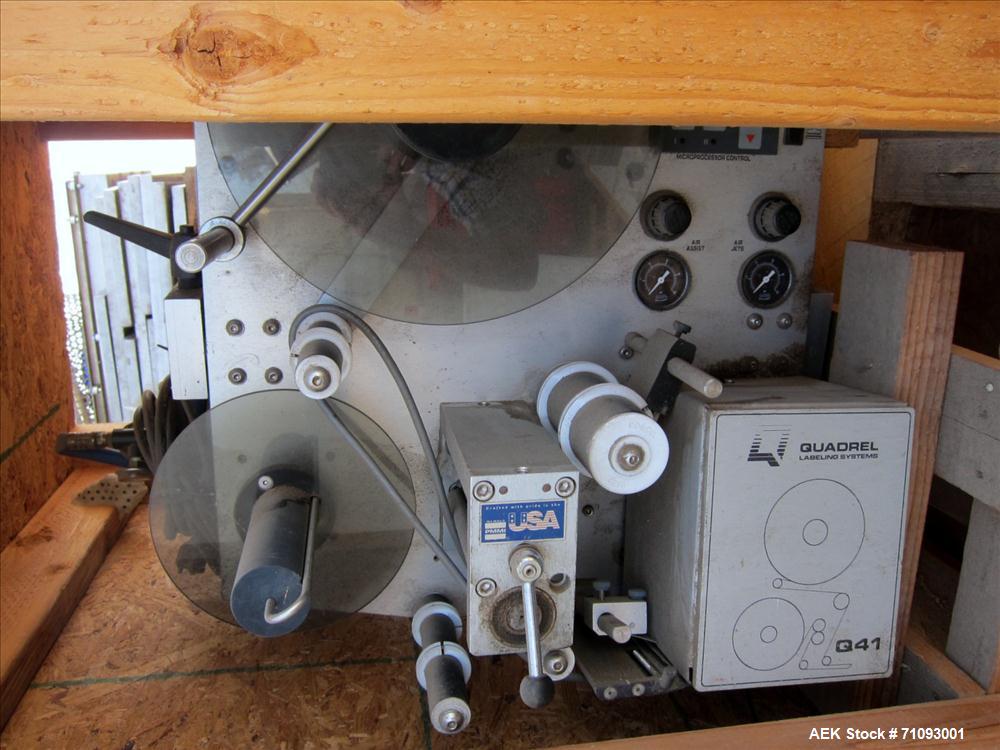 Used Quadrel Model Q41 Pressure Sensitive Spot Labeler on T-Stand. Capable of speeds up to 300 per minute (Depending on label size). Label size range: (Length) 1/2" - 5" or 13mm - 127mm (Width) 1/2" ...