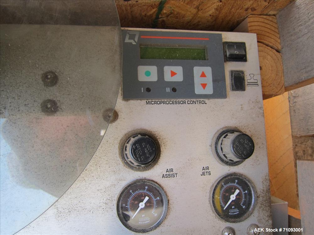 Used Quadrel Model Q41 Pressure Sensitive Spot Labeler on T-Stand. Capable of speeds up to 300 per minute (Depending on label size). Label size range: (Length) 1/2" - 5" or 13mm - 127mm (Width) 1/2" ...