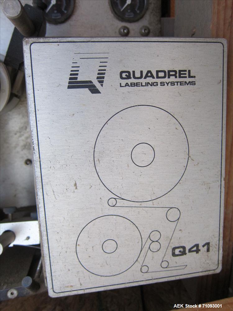 Used Quadrel Model Q41 Pressure Sensitive Spot Labeler on T-Stand. Capable of speeds up to 300 per minute (Depending on label size). Label size range: (Length) 1/2" - 5" or 13mm - 127mm (Width) 1/2" ...