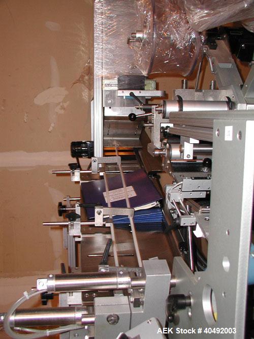 Used Shorewood tube labeler, model 350. Digital applicator head, indexing turret with quick-change mandrels. Capable of applying a wrinkle/bubble free wrap around label or spot labeling to existing p...