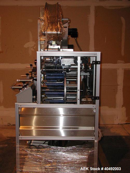 Used Shorewood tube labeler, model 350. Digital applicator head, indexing turret with quick-change mandrels. Capable of applying a wrinkle/bubble free wrap around label or spot labeling to existing p...