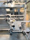 Used Accraply Model 350B-S Series Top and Bottom Labeling System. Capable of up to 120 products per minute depending on application. Special purpose labeling system developed specifically to apply to...