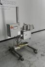 Used Accraply Model 350 Pedestal Mounted Pressure Sensitive Labeler. Last used in cosmetic operation.