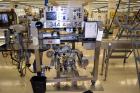 Used Accraply IM2000B bottom pressure sensitive spot labeler. Capable of speeds up to 150 containers per minute. Container size range: (Length) .5