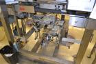Used Accraply IM2000B bottom pressure sensitive spot labeler. Capable of speeds up to 150 containers per minute. Container size range: (Length) .5