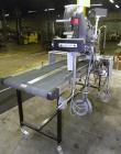 Used Harland Comet Pressure Sensitive Top Labeler, Head unit # 7809. Size range: width 10mm to 205mm, length 10mm to unlimited. Label core reel 76mm, diameter 400mm. Label web speed up to 42 meters/m...