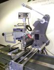 Used Harland Comet Pressure Sensitive Top Labeler, Head unit # 7809. Size range: width 10mm to 205mm, length 10mm to unlimited. Label core reel 76mm, diameter 400mm. Label web speed up to 42 meters/m...