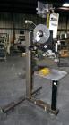 Used LSI Loose Loop Print & Apply Labeler, Model 1360, capable of 120 products per minute. Can accommodate up to 4