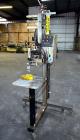 Used LSI Loose Loop Print & Apply Labeler, Model 1360, capable of 120 products per minute. Can accommodate up to 4