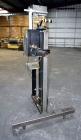 Used LSI Loose Loop Print & Apply Labeler, Model 1360, capable of 120 products per minute. Can accommodate up to 4