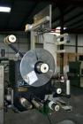 Used- LSI Loose Loop Print & Apply Labeler, Model 1360, capable of 120 products per minute. Can accommodate up to 4