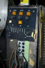 Used LSI Loose Loop Print & Apply Labeler, Model 1360, capable of 120 products per minute. Can accommodate up to 4