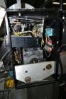 Used LSI Loose Loop Print & Apply Labeler, Model 1360, capable of 120 products per minute. Can accommodate up to 4