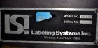 Used LSI Loose Loop Print & Apply Labeler, Model 1360, capable of 120 products per minute. Can accommodate up to 4