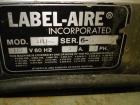 Used Label-Aire Pressure Sensitive Spot Labeler, Model 2111M. Designed for roll fed labels. It is microprocessor controlled and blows the labels on with a blast of air. It will apply labels sized fro...