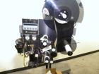 Used Label-Aire Model 2114 CDL High Speed Pressure Sensitive Spot Labeler. Machine is capable of speeds up to 1250 linear inches of web per minute. Has a label size range: length 3/4