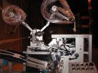 Used Shorewood tube labeler, model 350. Digital applicator head, indexing turret with quick-change mandrels. Capable of applying a wrinkle/bubble free wrap around label or spot labeling to existing p...