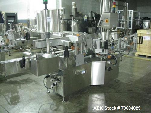 Used One (1) used Aesus wrap around labeler, model Premier Panel 362P, Herma label head, vision system, side bump belts, top hold down belt, reject and controls, 1/60/208 volt,