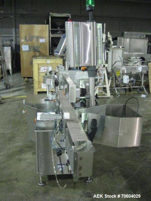 Used One (1) used Aesus wrap around labeler, model Premier Panel 362P, Herma label head, vision system, side bump belts, top hold down belt, reject and controls, 1/60/208 volt,