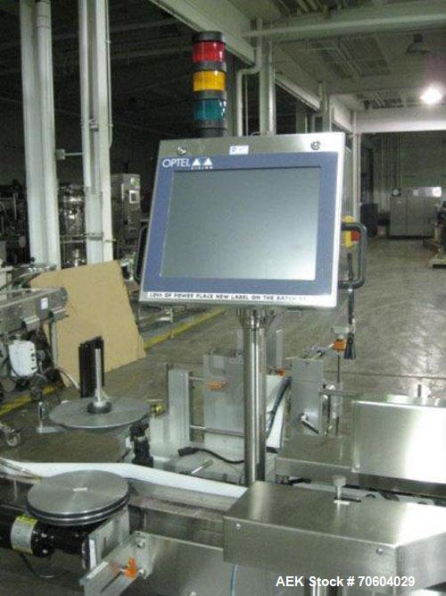 Used One (1) used Aesus wrap around labeler, model Premier Panel 362P, Herma label head, vision system, side bump belts, top hold down belt, reject and controls, 1/60/208 volt,