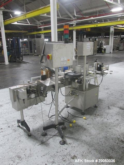 Used New Jersey Wrap Around Labeler, Model UNI300V-S007. Includes Optel vision system, model Optel OP300, 120 volt, serial# 15305-02, built 2004.