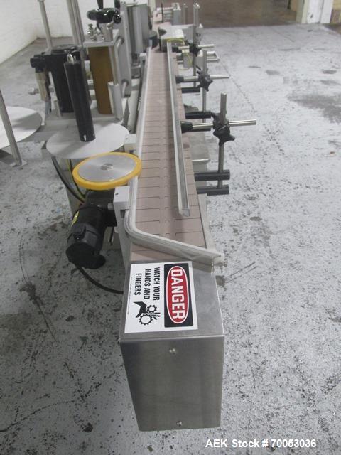 Used New Jersey Wrap Around Labeler, Model UNI300V-S007. Includes Optel vision system, model Optel OP300, 120 volt, serial# 15305-02, built 2004.