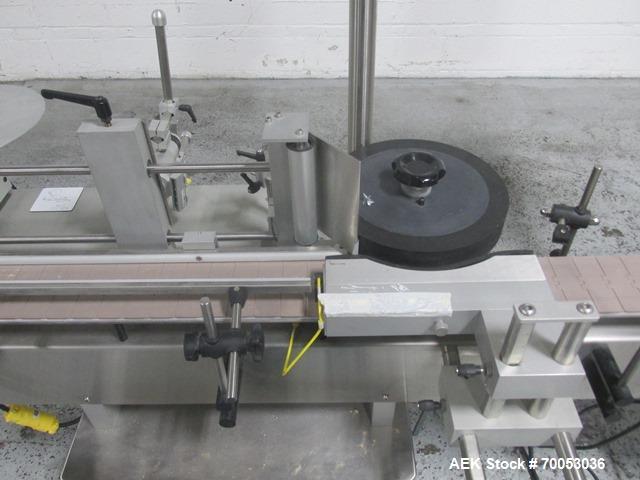 Used New Jersey Wrap Around Labeler, Model UNI300V-S007. Includes Optel vision system, model Optel OP300, 120 volt, serial# 15305-02, built 2004.