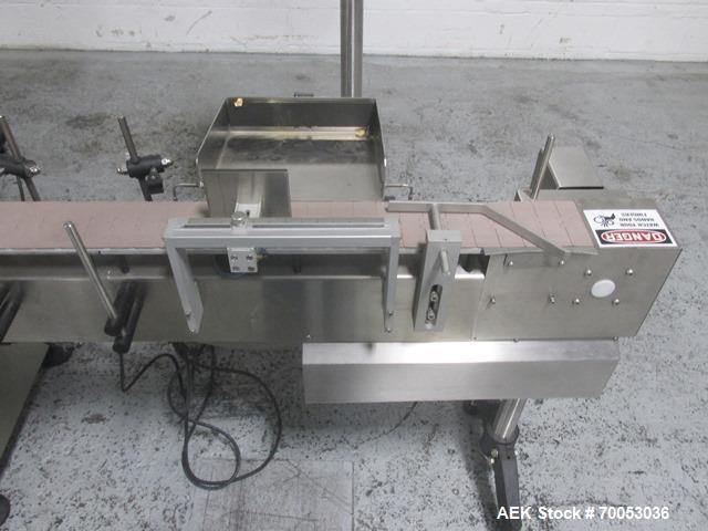 Used New Jersey Wrap Around Labeler, Model UNI300V-S007. Includes Optel vision system, model Optel OP300, 120 volt, serial# 15305-02, built 2004.