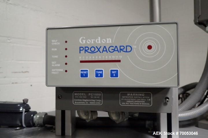 Used Used Sancoa rotary labeler. model# PRL 1500R-S10, 10 station, right hand label head, dual label unwind stand, Industrial Dynamic Lastec laser coder with vision system, onboard side serter head, ...