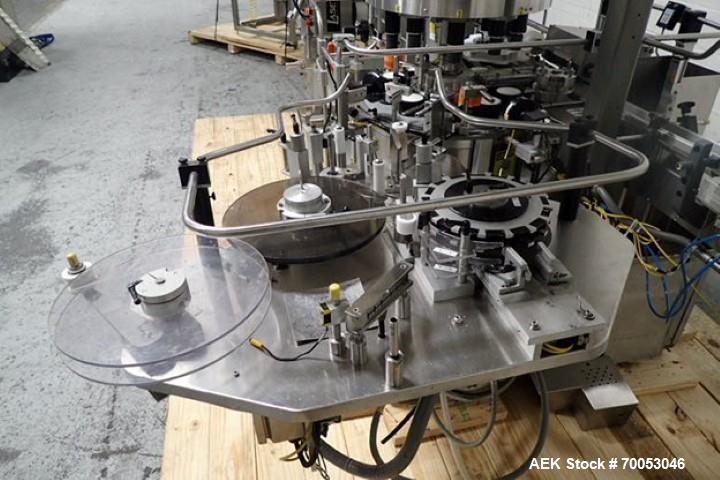 Used Used Sancoa rotary labeler. model# PRL 1500R-S10, 10 station, right hand label head, dual label unwind stand, Industrial Dynamic Lastec laser coder with vision system, onboard side serter head, ...