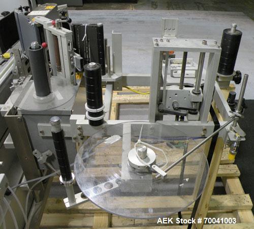 Used Accraply Inline Automatic Wrap Around Pressure Sensitive Labeler, Model 35W. Product Size Range: diameter 3/4" to 8", height 3/4" to 16". Label Size Range: width) 1/2" to 6", length 2" to 12". M...