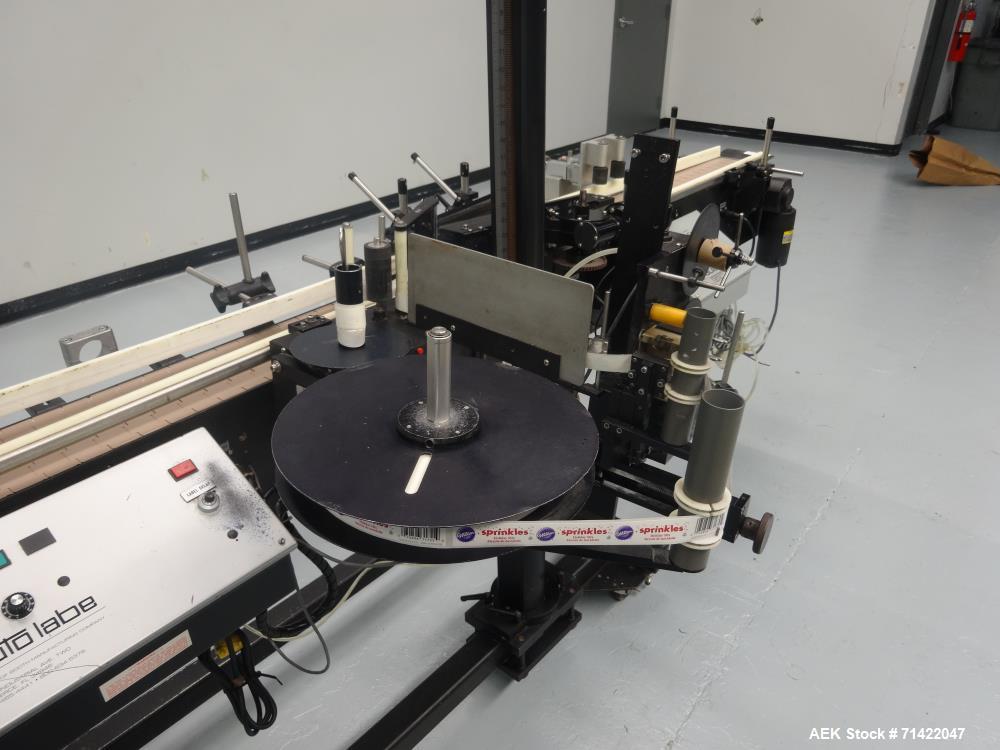 Used Auto Labe Model 550 Pressure Sensitive Spot Labeler.